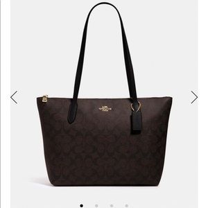 COACH brown tote in Signature canvas